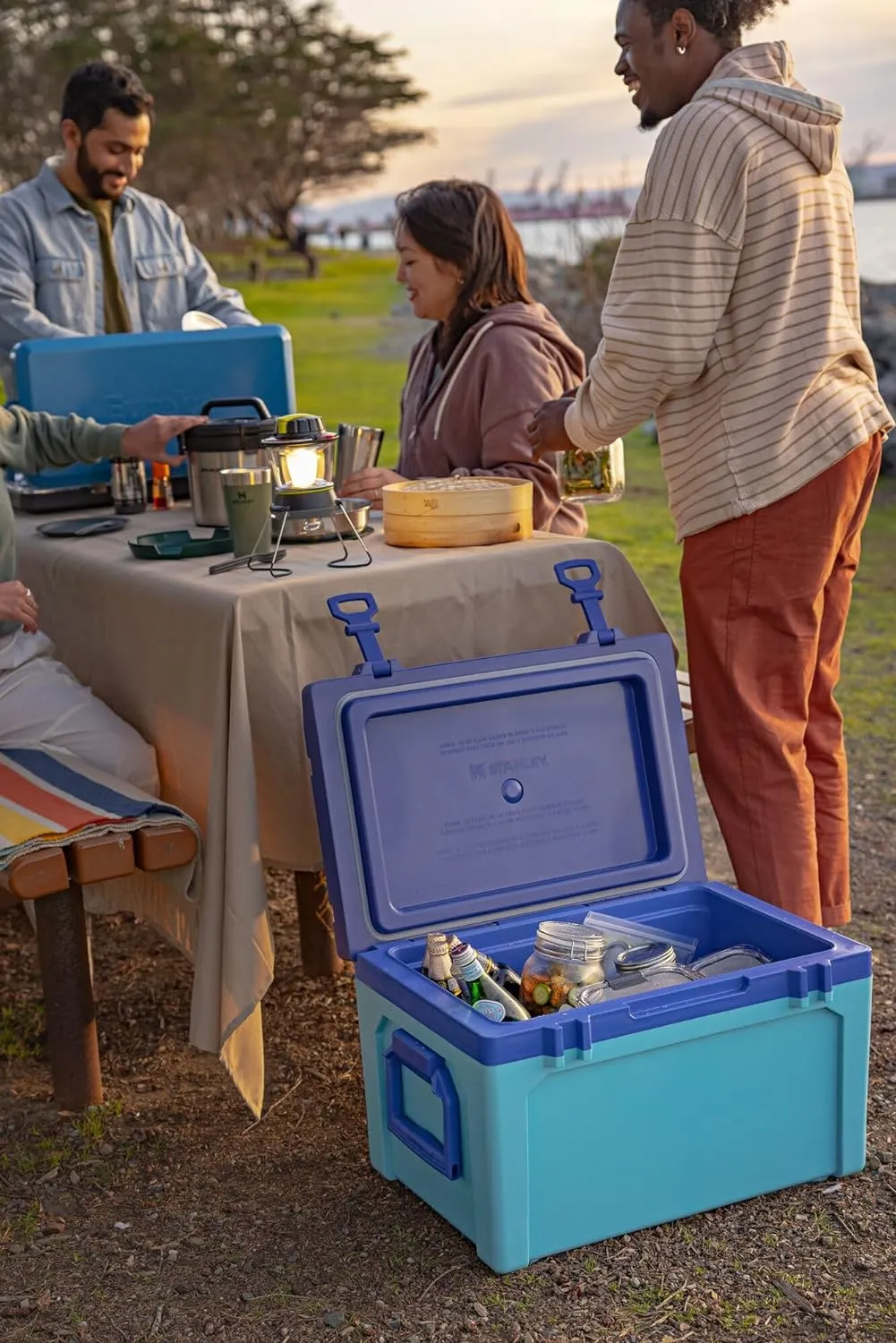 Stanley Adventure Outdoor Cooler 50 qt | Heavy Duty Outdoor Camping Cooler with Easy Carry Side Handles | 6 Days Cooling Ice Chest for 82 Cans | Flat Top Doubles as Seat | BPA-Free | Black 2.0